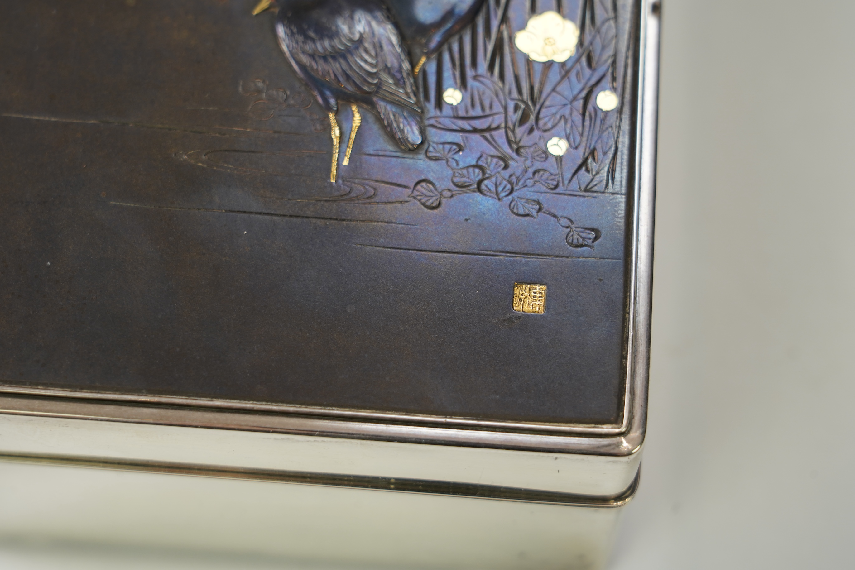 A Japanese shibuichi and shakudo mounted silver box and cover, Taisho period